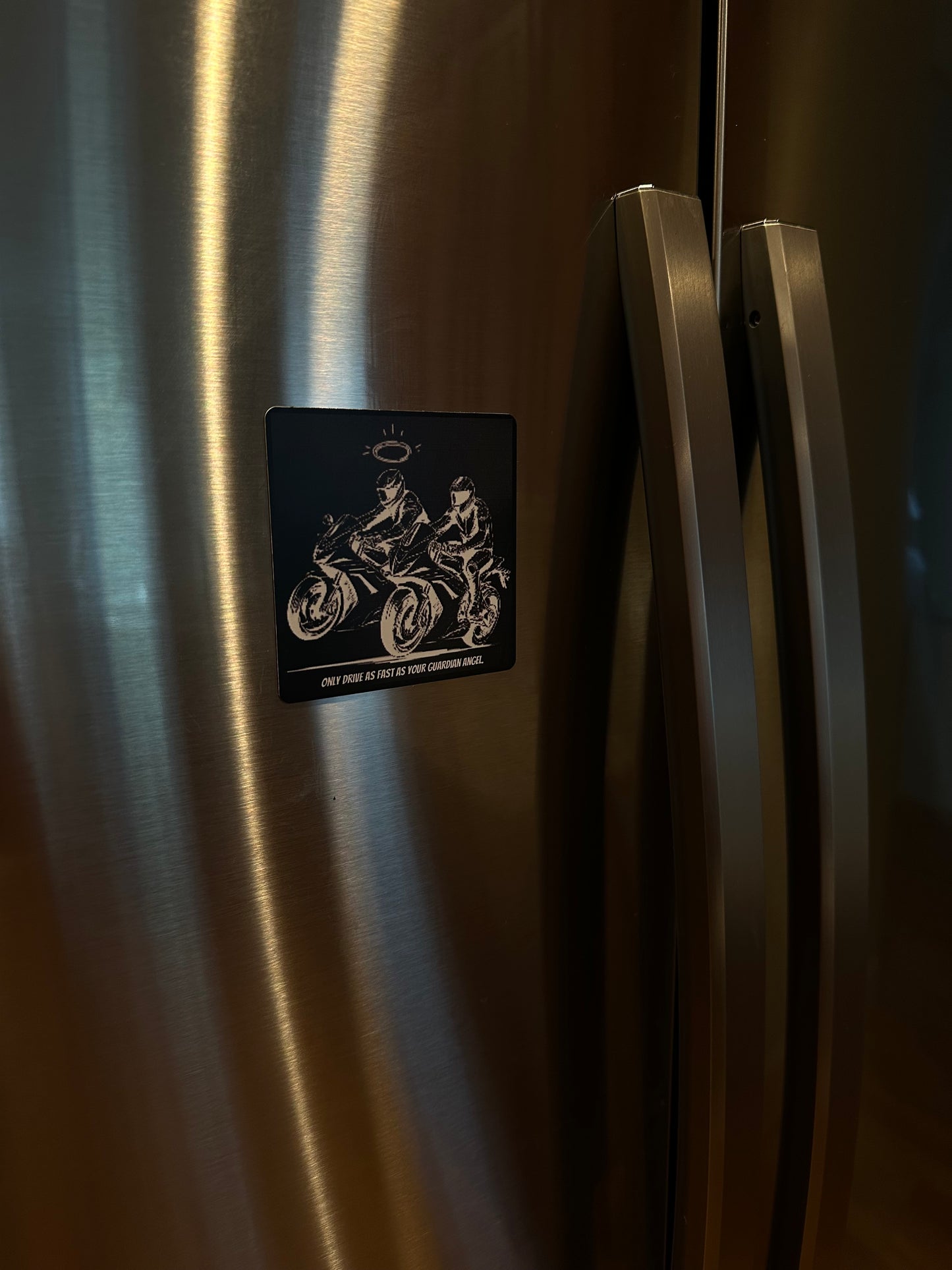 Only drive as fast as your guardian angel fridge magnet